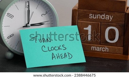 Calendar reminder to turn clocks ahead in spring at the beginning of daylight saving time on March 10, 2024. Royalty-Free Stock Photo #2388446675
