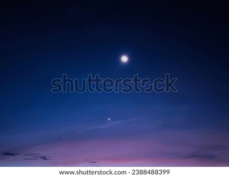 I looked  up to the sky and i found something unusual. This is my first time saw the stars that aligned vertically. I checked and they are actually consist of Moon, Venus and Jupiter. Amazing event!! Royalty-Free Stock Photo #2388488399