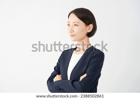 Portrait ofAsian businesswoman in white background Royalty-Free Stock Photo #2388502861
