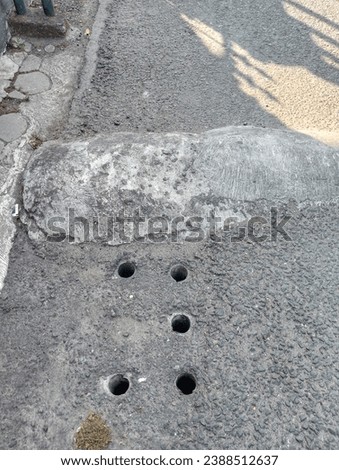Random water drain on street