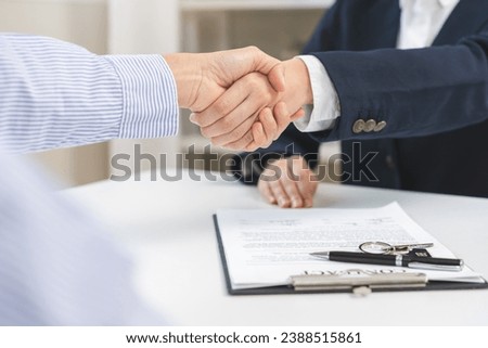 Sell agent, success deal asian young woman handshake or shaking hands with landlord realtor, client male after buyer man signed rental, lease contract. Banker agreement mortgage loan, property lease.