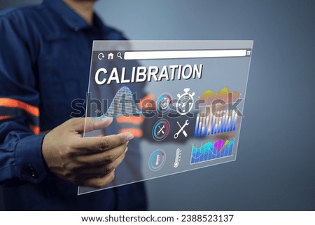 Engineer calibrate the engineering tool such as stopwatch thermometer and mechanical device via a virtual screen to ensure availability and minimal deviation according to ISO IEC 17025 standards Royalty-Free Stock Photo #2388523137