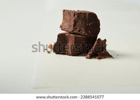 Chocolate candy processing stages, including from raw processing to finished products, cutting, packaging, and molding