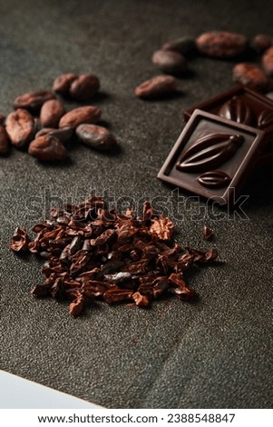 Chocolate candy processing stages, including from raw processing to finished products, cutting, packaging, and molding