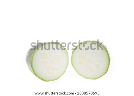 Fresh zucchini on a white background, close-up pictures