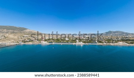 Sudak, Crimea. View of the city beaches of Sudak from the Black Sea. Aerial view Royalty-Free Stock Photo #2388589441
