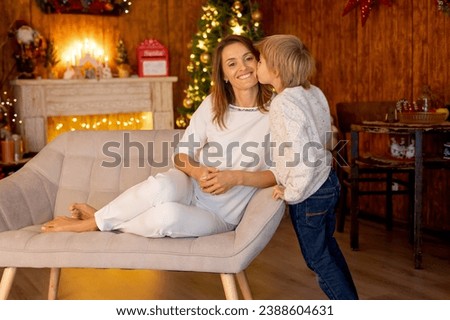 Happy family with kids on Christmas at home, enjoying quality time together as a family