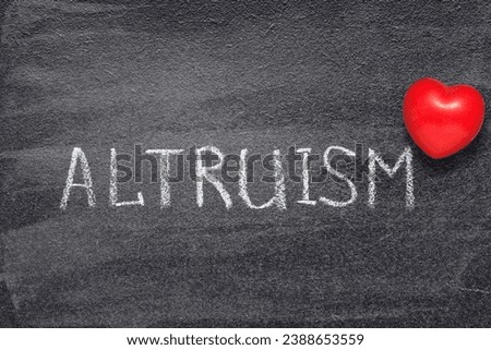 altruism word written on chalkboard with red heart symbol Royalty-Free Stock Photo #2388653559