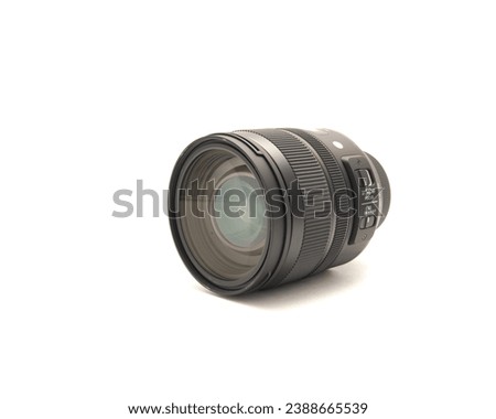 Front view advanced aspherical landscape lens made in Japan for DSLR full frame camera photography isolated on white background with clipping path copy space. Digital photo equipment accessory