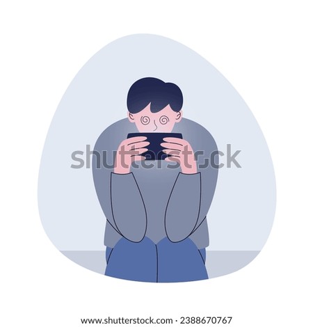 Teenager playing game with smart phone with blue light reflection harmful to eyes. Smartphone game addiction Royalty-Free Stock Photo #2388670767