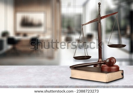 Lawyer wooden hammer on table in office