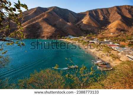 Taganga is a picturesque fishing village located on the Caribbean coast of Colombia, near the city of Santa Marta Royalty-Free Stock Photo #2388773133
