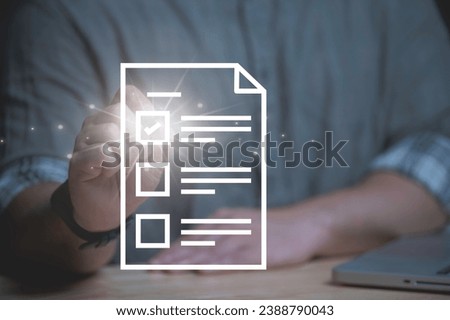 Man use pen on virtual screen contact questionnaire with checkboxes,E-signing on an e-document, electronic signature, paperless office concept,Take an assessment,Online survey