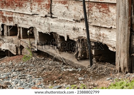 ratting exterior wood wall of a historic building in North carolina  Royalty-Free Stock Photo #2388802799