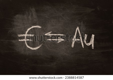Concept of the value of the euro in relation to gold, chalk drawing.