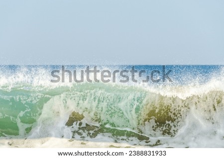 Set of pictures of a fantastic ocean wave in different stages. Blue sunrise sky. San Jose del Cabo. Mexico.