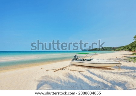 Speedboat at the tropical beach at Phu Quoc island  in Vietnam Royalty-Free Stock Photo #2388834855