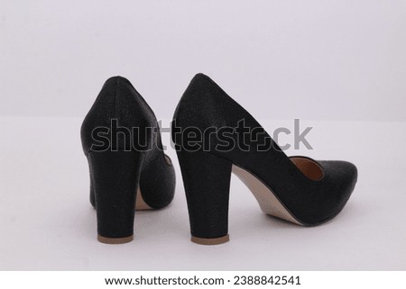 This the picture of women court shoes
"Elegant women's court shoes featuring a classic design with a pointed toe and moderate heel. Perfect for a sophisticated and polished look in any formal setting.