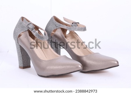 This the picture of women court shoes
"Elegant women's court shoes featuring a classic design with a pointed toe and moderate heel. Perfect for a sophisticated and polished look in any formal setting.