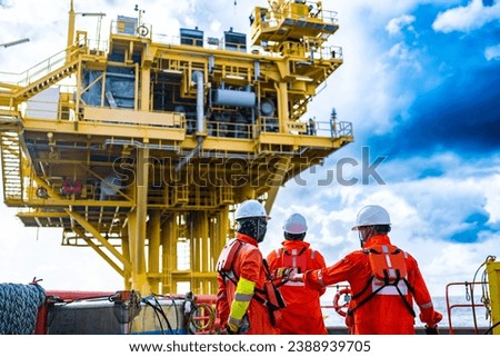 Offshore oil and gas wellhead remote platform which produced raw material for sent to onshore refinery, power generation and petrochemical industry. Royalty-Free Stock Photo #2388939705