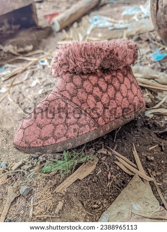 shoes from childhood memories that have been worn away by age Royalty-Free Stock Photo #2388965113