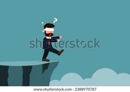 A blindfolded businessman walks towards a cliff. The concept of traveling without a plan or goal can lead to disaster or danger. A businessman who walks towards failure without realizing it Royalty-Free Stock Photo #2388970787
