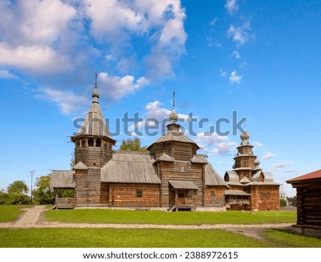 Wooden Russian church in Suzdal, Russia. Old town of Suzdal is historical landmark as part of Golden Ring of Russia. Orthodox temple in museum of architecture. Royalty-Free Stock Photo #2388972615