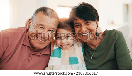 Grandparents, grandchild and smile in family portrait, love and picture for memory, hug and bonding. Happy mexican people, care and relax on couch, generations and connection at home, joy and embrace