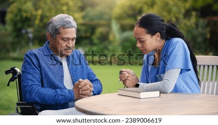 Wheelchair, praying or nurse with senior man for care, support or trust in retirement or nature. Caregiver, help and person or elderly patient with a disability or medical professional for worship
