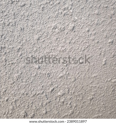 Picture of a cement slab with a rough texture, color tone, style.