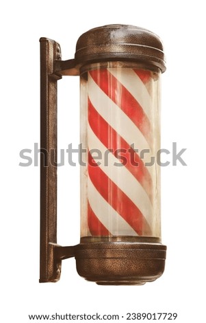 Vintage weathered barber shop pole with red and white stripes isolated on a white background