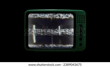 green retro looking tv tube isolated, cool photo placeholder with damaged tv signal. Royalty-Free Stock Photo #2389043675