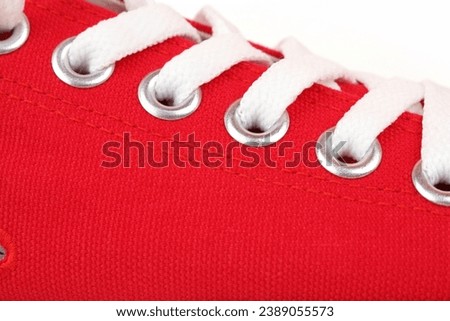 Red canvas shoes isolated on white background