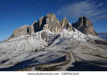 Sasso Piatto group mountain range on a sunny day, freshly snowed. Perfect place for hiking, skiing an rock climbing in south tyrol, italy
