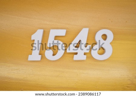 The golden yellow painted wood panel for the background, number 1548, is made from white painted wood.