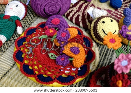 Woolen art in handcraft, Multicolored knitted handmade children toys.
