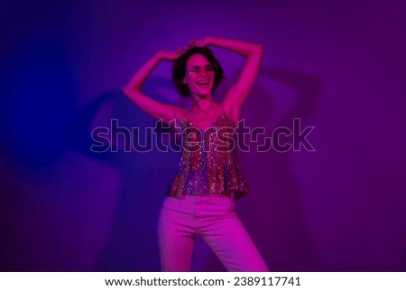 Photo of positive cheerful lady enjoying night club disco dancing freestyle isolated bright color neon background