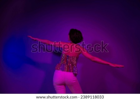 Back rear spine photo of carefree lady flying dance on new year christmas party isolated neon color background