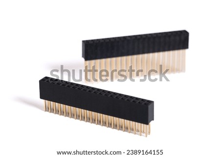 40 Pin GPIO connector header isolated on white background. 2x20 pins Raspberry Pi stacking female header. Straight extra tall and small extender for PCB, HATs board Royalty-Free Stock Photo #2389164155