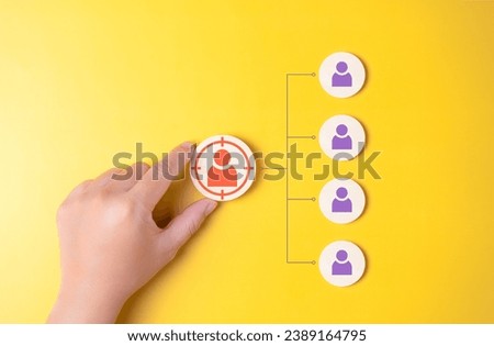 Customer target, Buyer individual person, Client segmentation advertising concept. Specific buyer marketing, customer base strategies. Hand pick wooden connected labels with focus on customer icons.