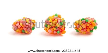 A Sweet and Tangy Candy with Small Candies on the Outside of a Chewy Center on a White Background Royalty-Free Stock Photo #2389211645