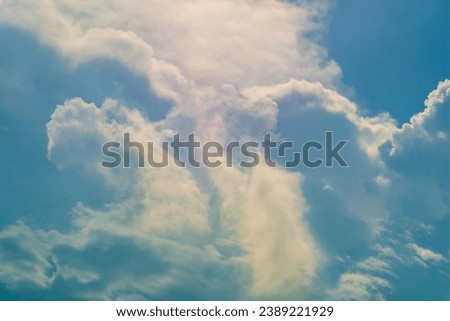 Extraordinarily beautiful clouds appeared in the sky. The forces of nature that can move such large amounts of water over long distances. Template, Background, Screensaver, dramatic cloudscape.