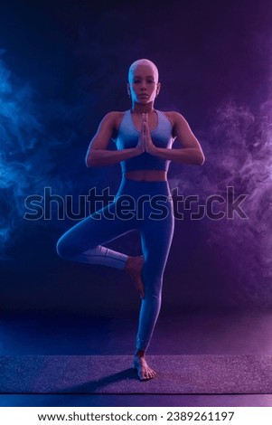 Yoga Classes Indoor. Sports recreation. Beautiful black young woman. Individual sports.