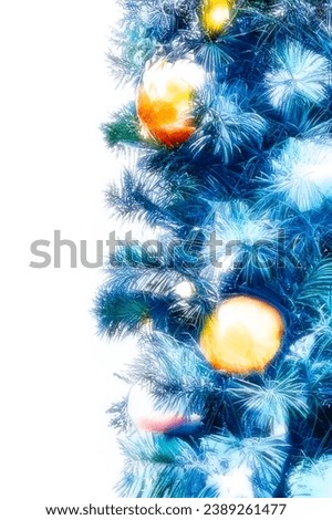 an isolated picture of pine christmas tree branches with orange decorations and lights