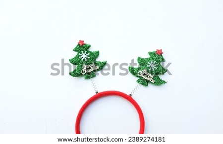 Beautiful headband funny christmas trees isolate on a white backdrop.
concept of joyful Christmas party,New year is coming soon, festive season decoration with Christmas elements