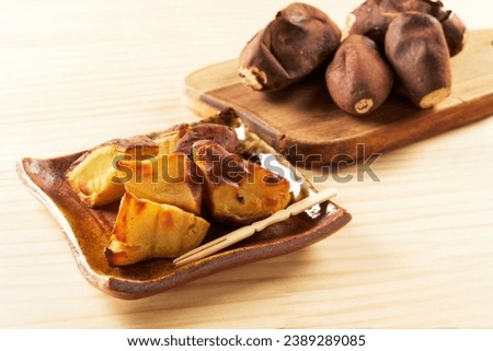 Bite-sized Japanese sweet potato on wooden background
