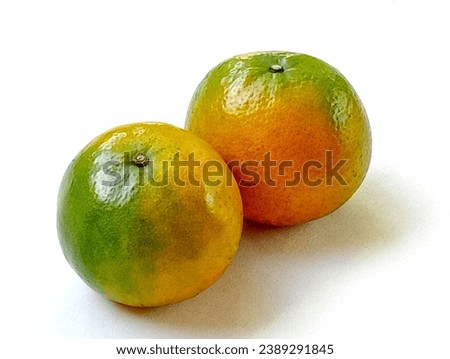 SHOTLIST health sai num phueng orange placed on a white background. Oranges stimulate the body's immune system. Close -up shot of the oranges.
