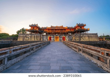 Ngo Mon gate - the main entrance of Hue Imperial City in Hue city, Vietnam, during sunset time. The World Heritage Site and famous travel destination Royalty-Free Stock Photo #2389310061