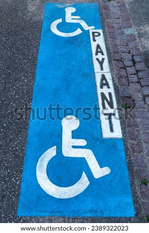 Signs on asphalt, Parking for people with disabilities, Alsace, France