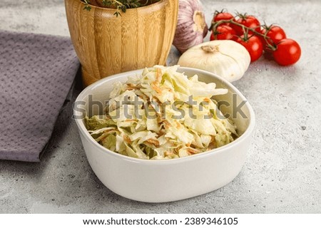 Dietary tasty Cole slaw salad with cabbage and carrot Royalty-Free Stock Photo #2389346105